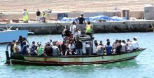Un barcone di migranti</br> in arrivo sulle nostre coste.